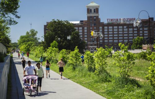 Groups of people walking along the eastside trail in atlanta