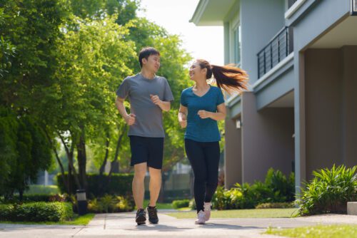 Couple Jogging in a neighborhood