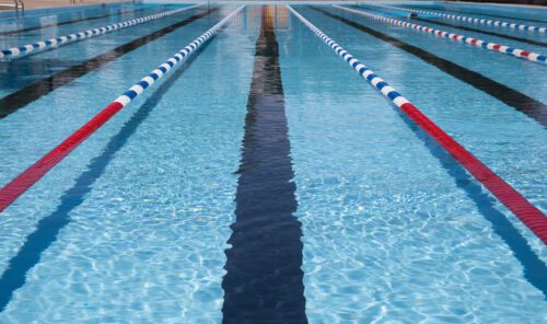 competitive pool with marked lanes and dividers