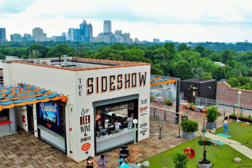 The sideshow bar with Atlanta skyline in the background