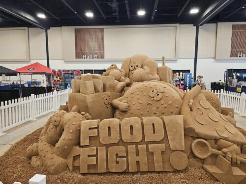 a food fight themed sand castle with food characters